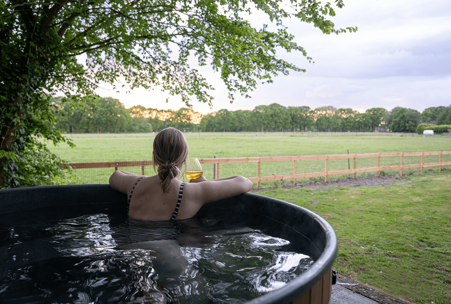 Lovely family lodge with hottub and large garden overlooking the meadow
